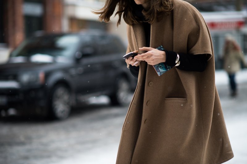 Girl in oversized short sleeve coat