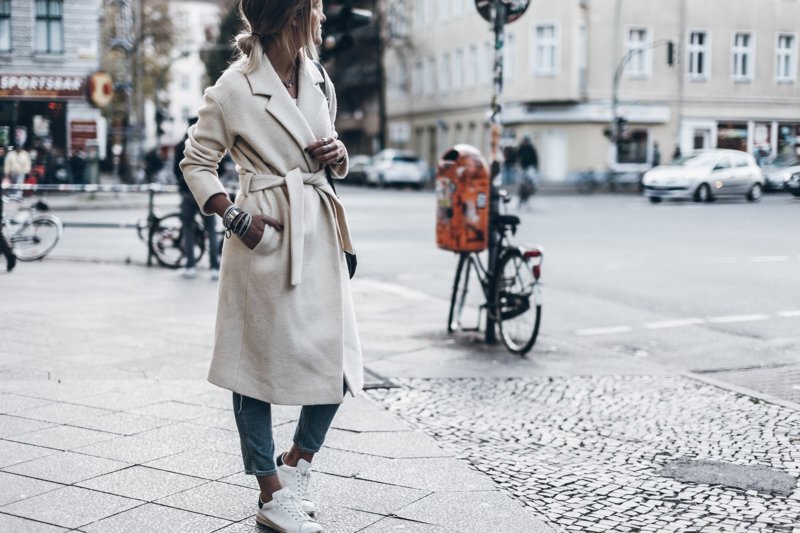 Girl in an elongated coat