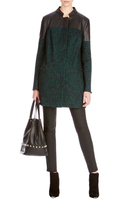 Green tweed coat with black leather accents