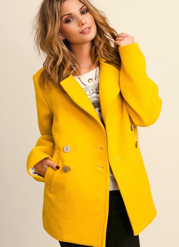 Girl in a yellow coat