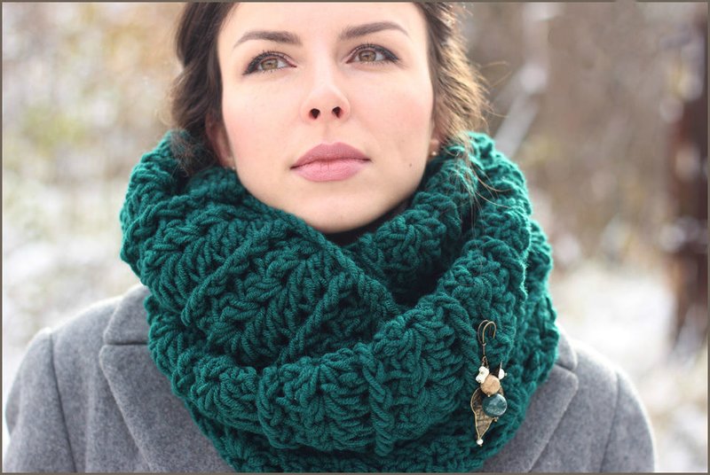 Girl in a knitted scarf snood