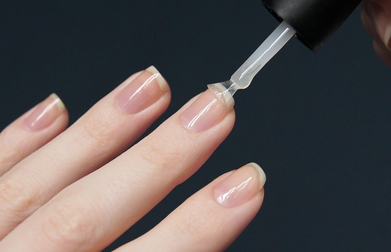 Primer application on nails Primer application on nails