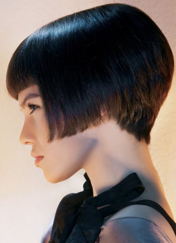 Girl with a bob on a leg and bangs