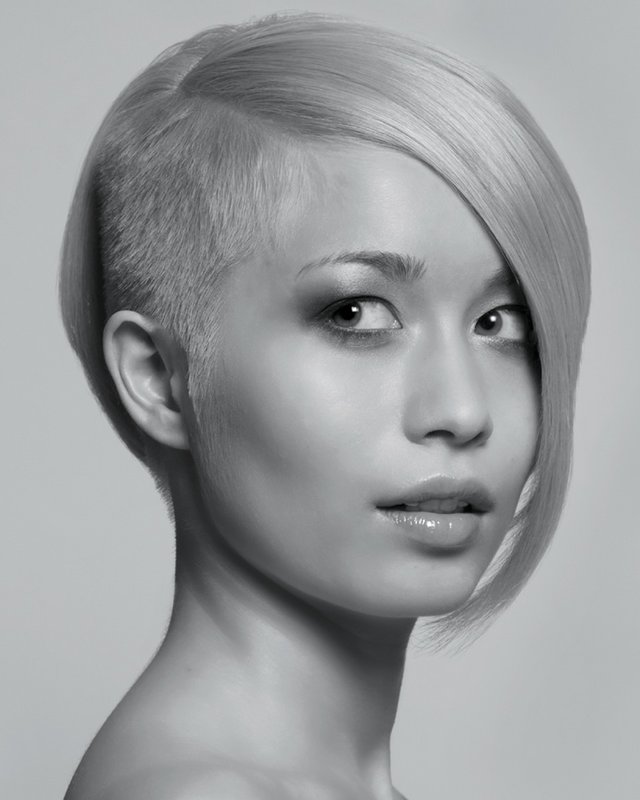 Girl with a bob haircut and shaving a temple