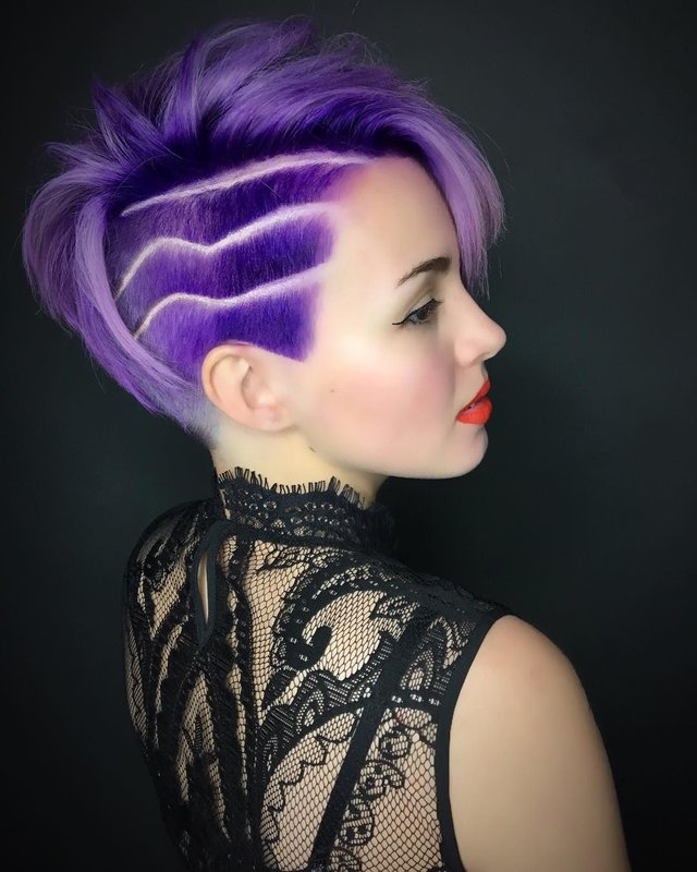 Girl with lines on shaved temples and a nape