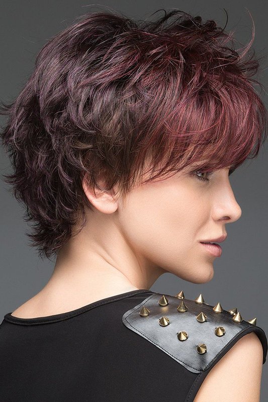 Shag haircut girl with oblique bangs