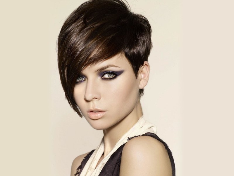 Girl with an asymmetric haircut on short hair