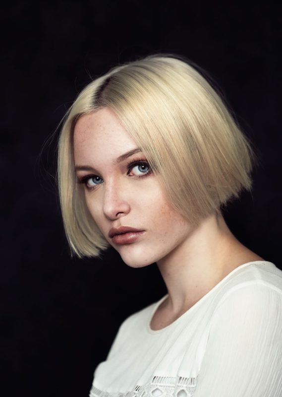 The girl with a classic square on short hair