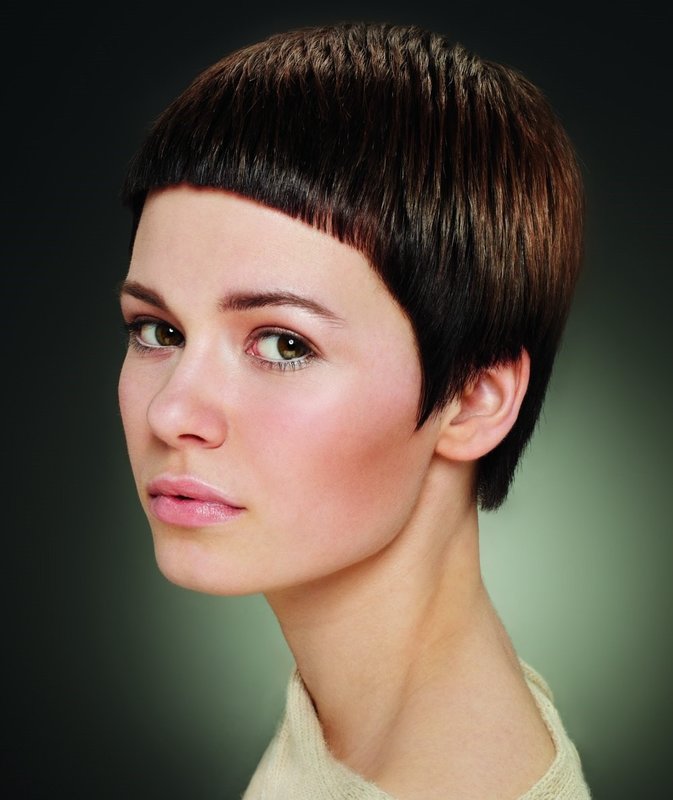 Garcon haircut girl with straight short bangs