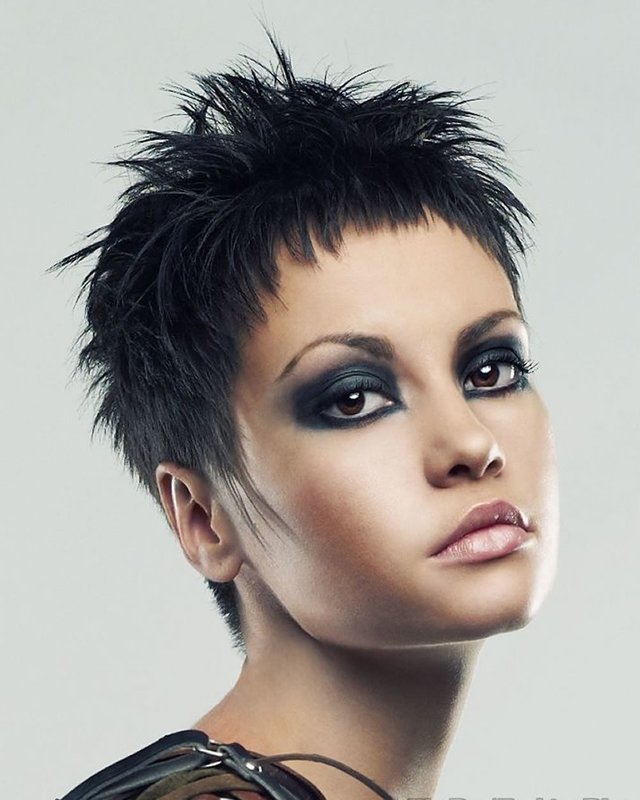 Girl with a pixie haircut and a short bang