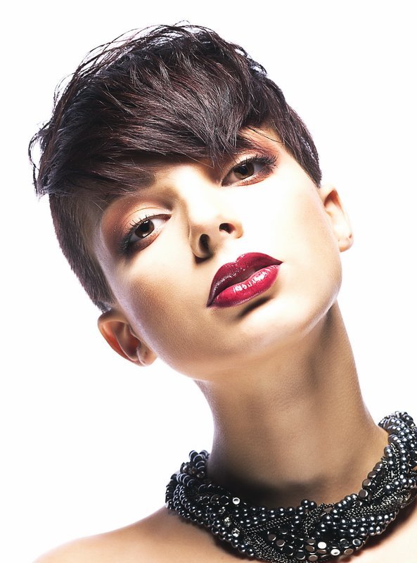 Girl with a pixie haircut and asymmetric bangs