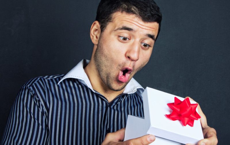 Gift for a man Husband opens anniversary gift