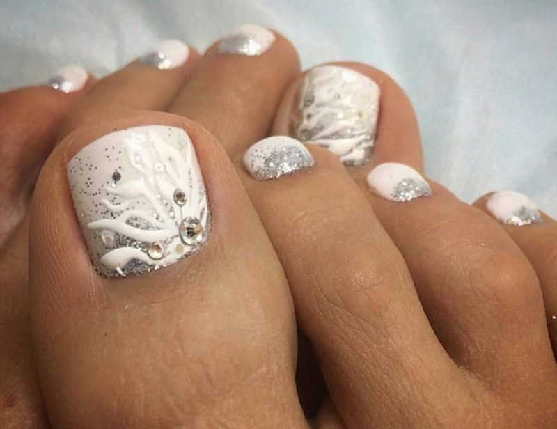 White pedicure with 3D effect White pedicure