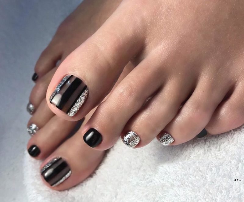 The combination of black varnish and glitter Black with silver