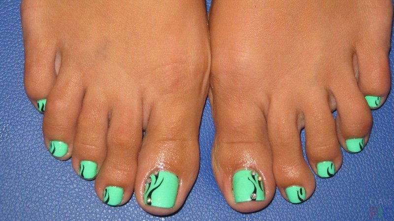 Patterned mint pedicure Mint color with rhinestones