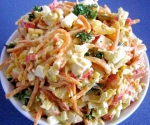 Salad with carrots, cheese and crab sticks