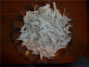 Salad with chicken, mushrooms and pineapple with curry