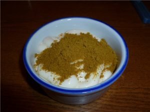 Salad with chicken, mushrooms and pineapple with curry