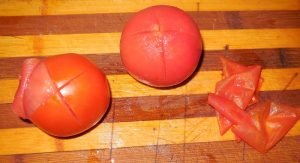 Salted tomatoes with garlic and herbs