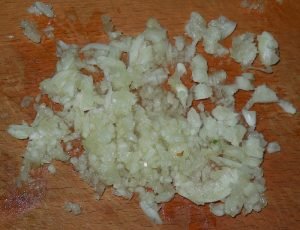 Salted tomatoes with garlic and herbs