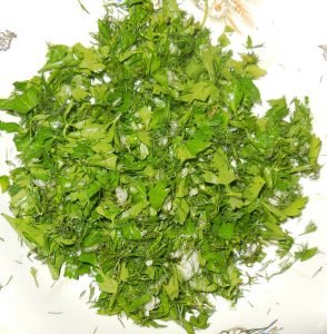 Salted tomatoes with garlic and herbs