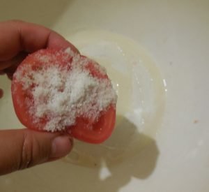 Salted tomatoes with garlic and herbs