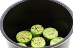 Zucchini in a slow cooker with cheese
