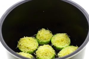 Zucchini in a slow cooker with cheese