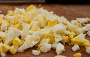 Salad with crab sticks and rice