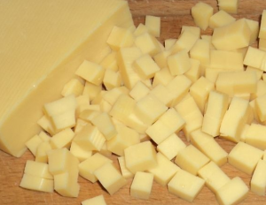 Salad of crab sticks and pineapple