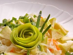 Sauerkraut salad with apple and green onions