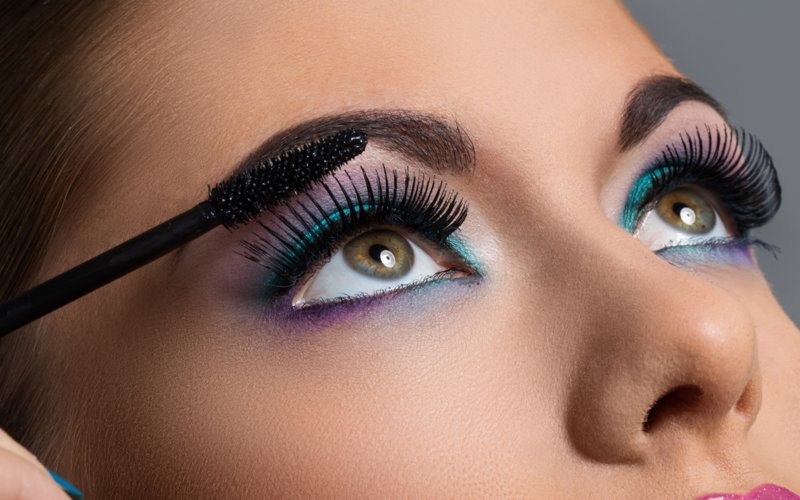 Mascara application on eyelash extensions