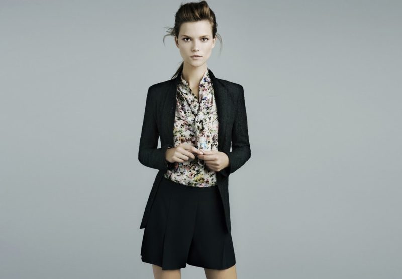 Colorful blouse with classic shorts and a cardigan Colorful blouse with classic shorts and a cardigan