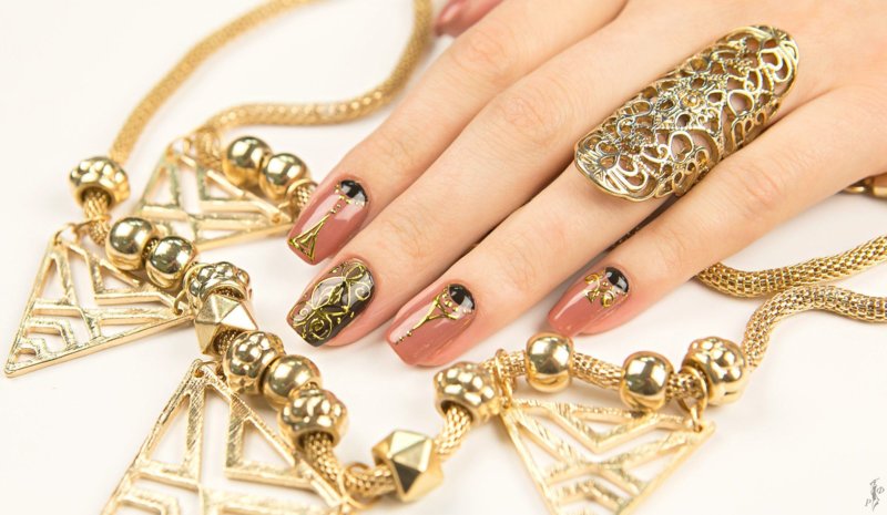 Gold ornaments in the style of boho. Golden art deco