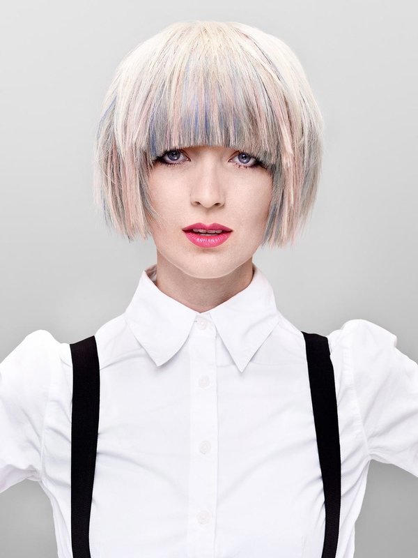 Girl with bangs in the shape of an arch