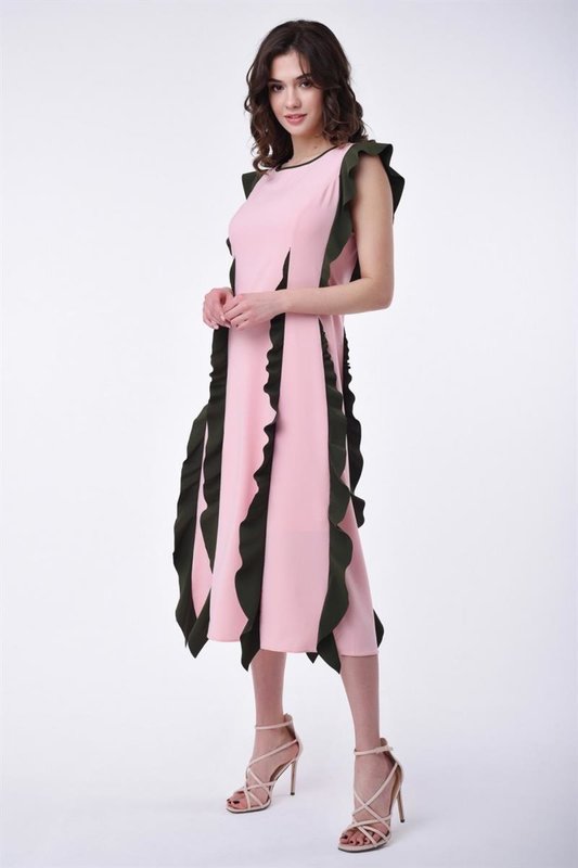 Girl in a cocktail dress with vertical ruffles Girl in a cocktail dress with vertical ruffles