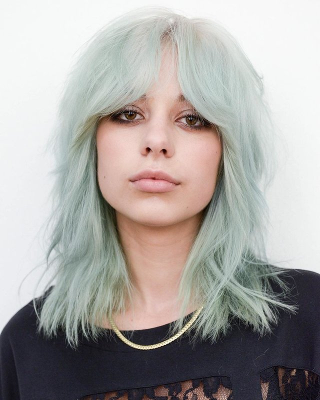 Girl with double oblique bangs