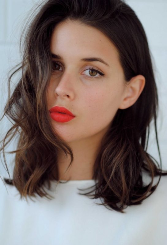 Girl with long bangs combined with medium hair