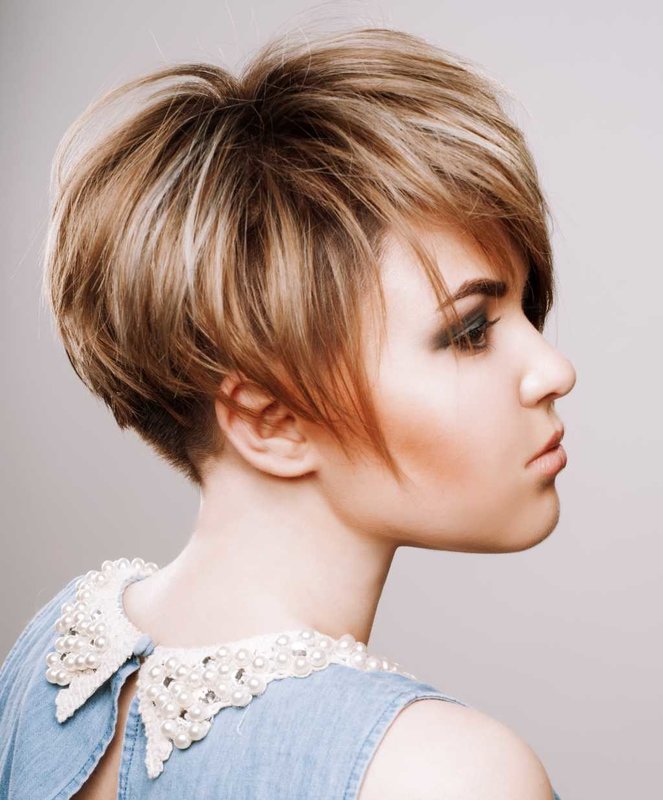 Girl with a short haircut and a slanting bang