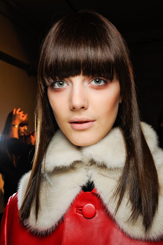 Girl with an arched bang and long hair