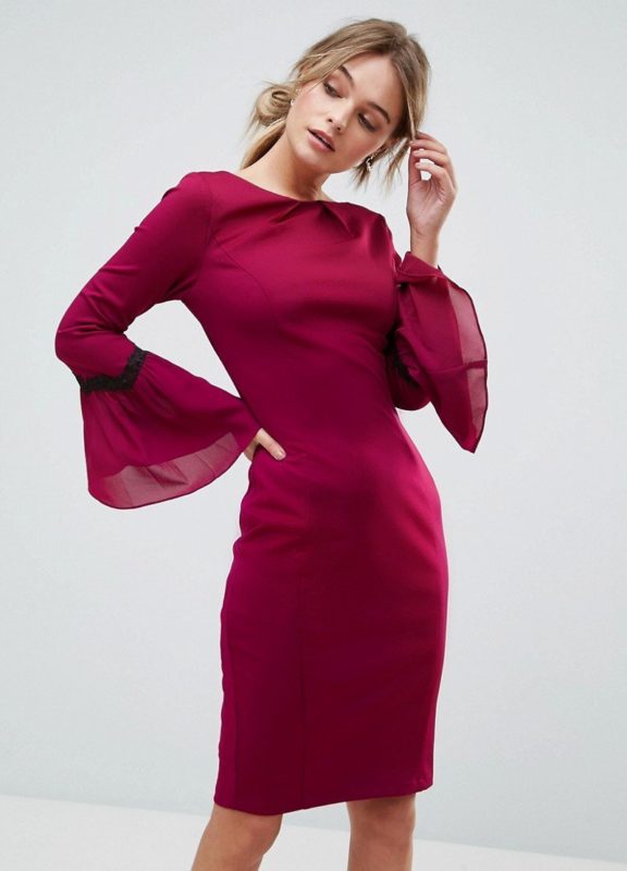 Girl in a cocktail dress with bells Girl in a cocktail dress with bells