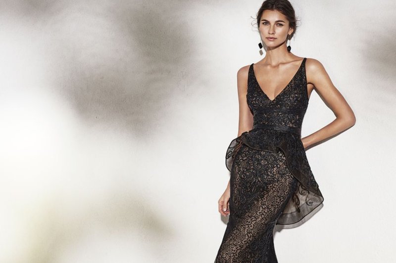 Girl in a cocktail dress with lace and peplum Girl in a cocktail dress with lace and peplum