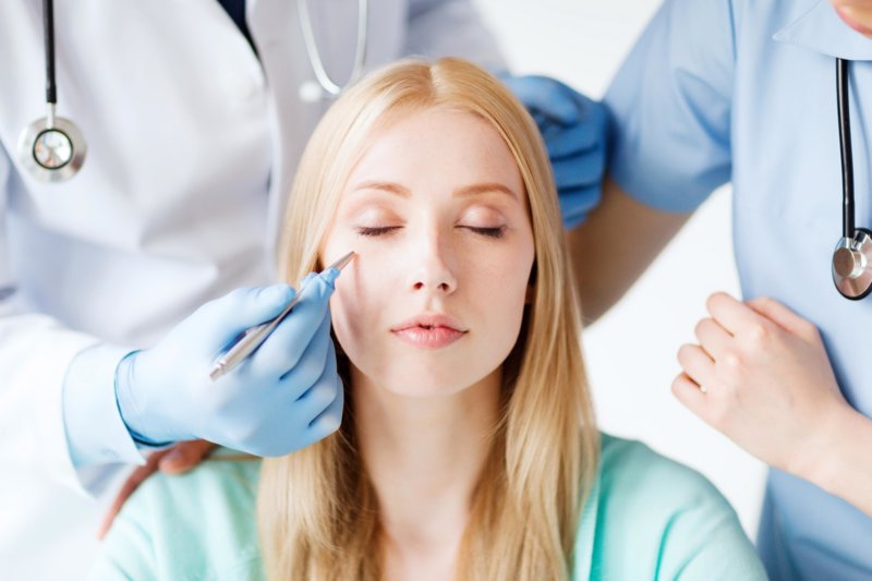 Beautician consultation Examination of the face before cleaning