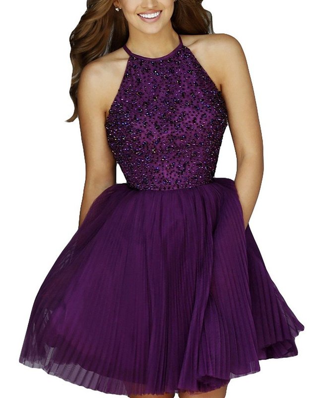 Girl in a purple cocktail dress with rhinestones on the bodice Girl in a purple cocktail dress with rhinestones on the bodice