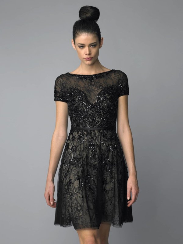 Girl in a black cocktail dress with sequins Girl in a black cocktail dress with sequins