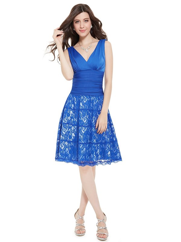Girl in a blue cocktail dress with lace on a skirt Girl in a blue cocktail dress with lace on a skirt