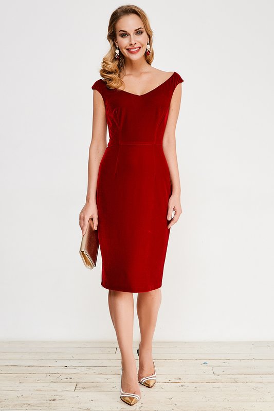 Girl in a red cocktail dress sheath with a boat neckline Girl in a red cocktail dress sheath with a boat neckline