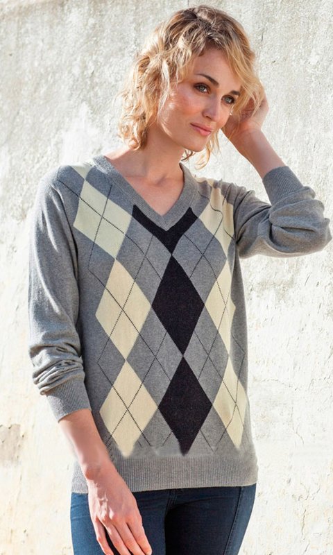 Girl in a sweater with a diamond pattern