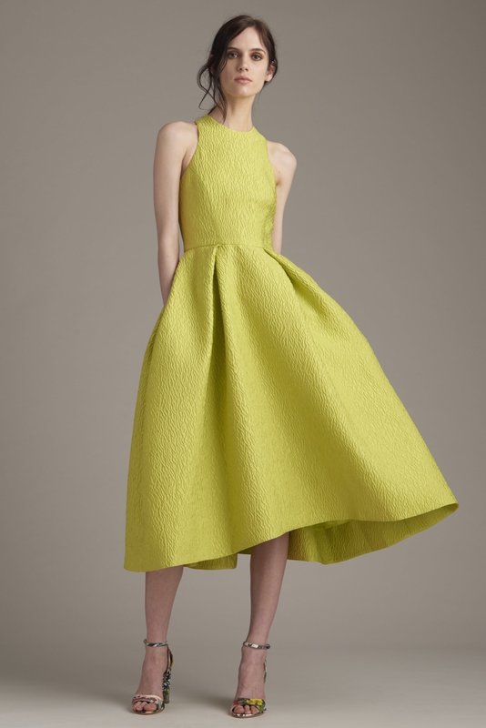 Girl in a yellow cocktail dress A-silhouette Girl in a yellow cocktail dress A-silhouette