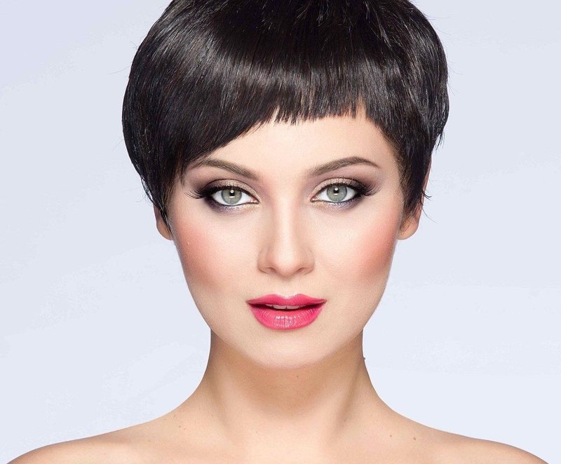 Short asymmetric bangs on short hair